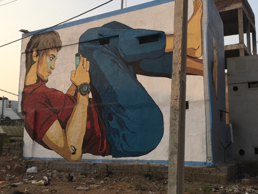 hyderabad_boy on phone_street art
